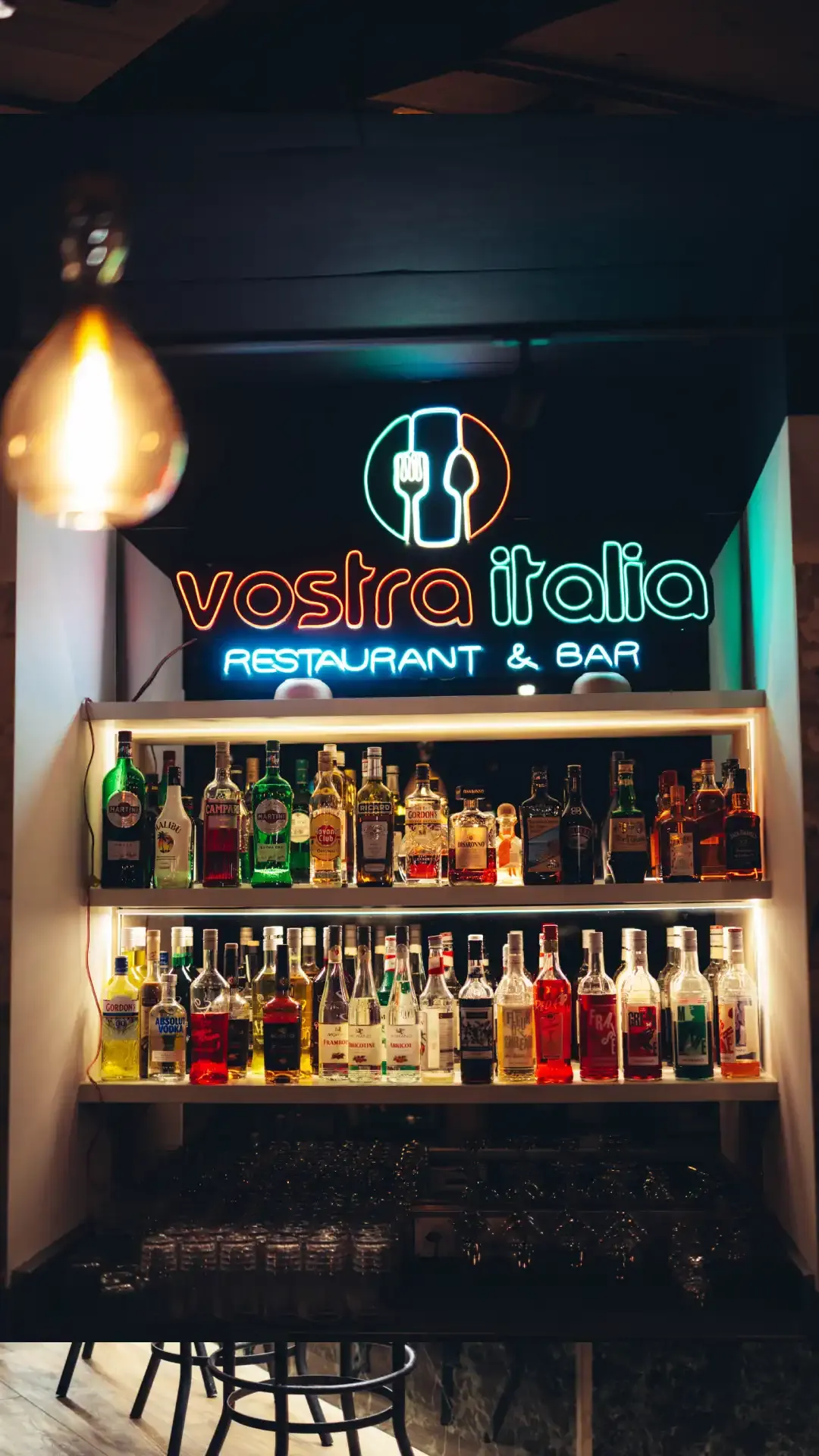 The bar and its neon sign